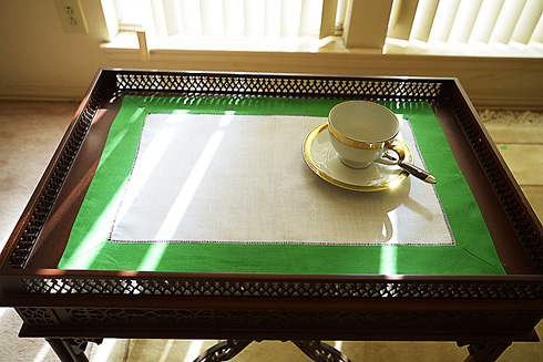 Place Mat. Kelly Green colored trimming.
